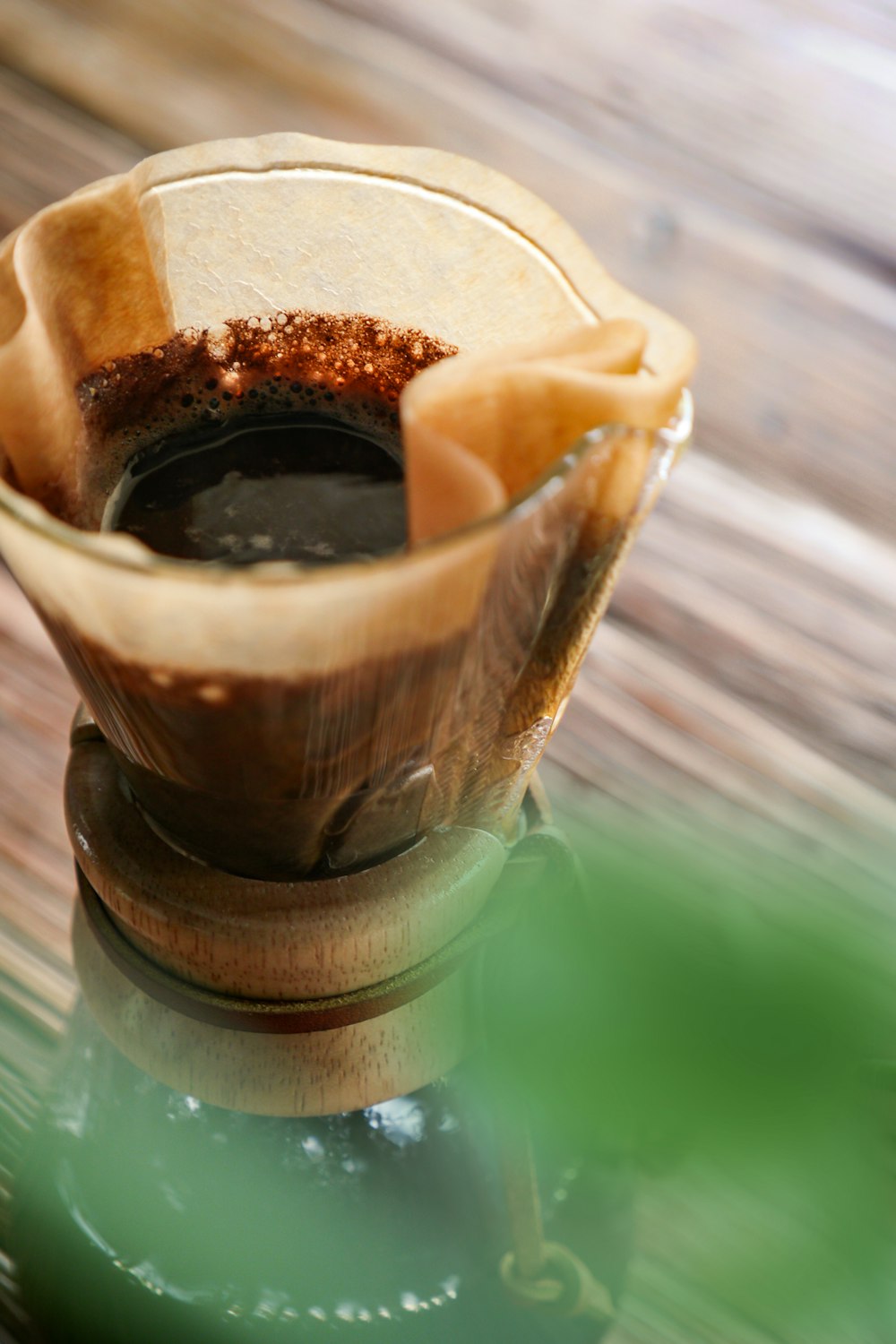 clear glass cup with black liquid