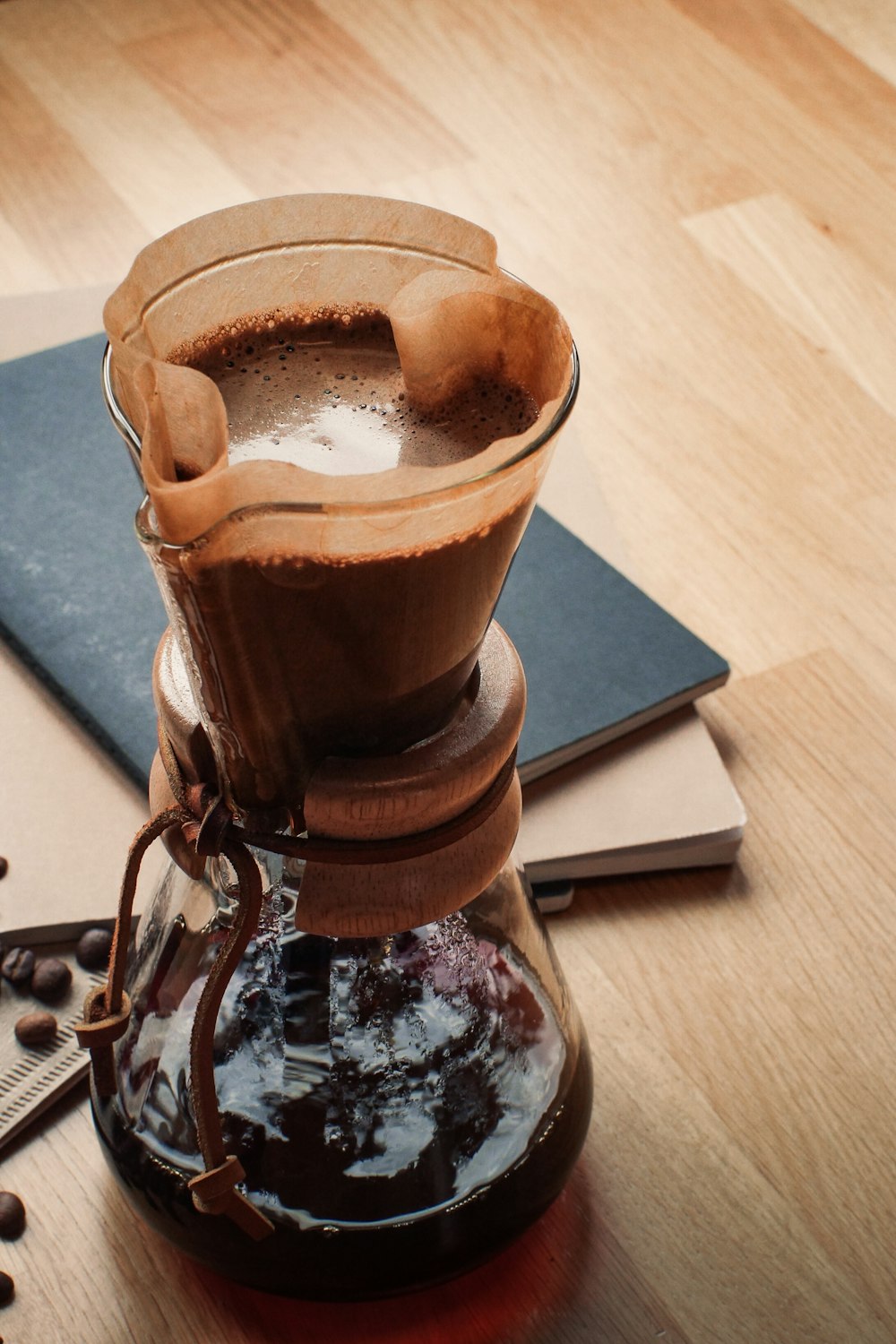 brown ceramic mug on brown wooden table