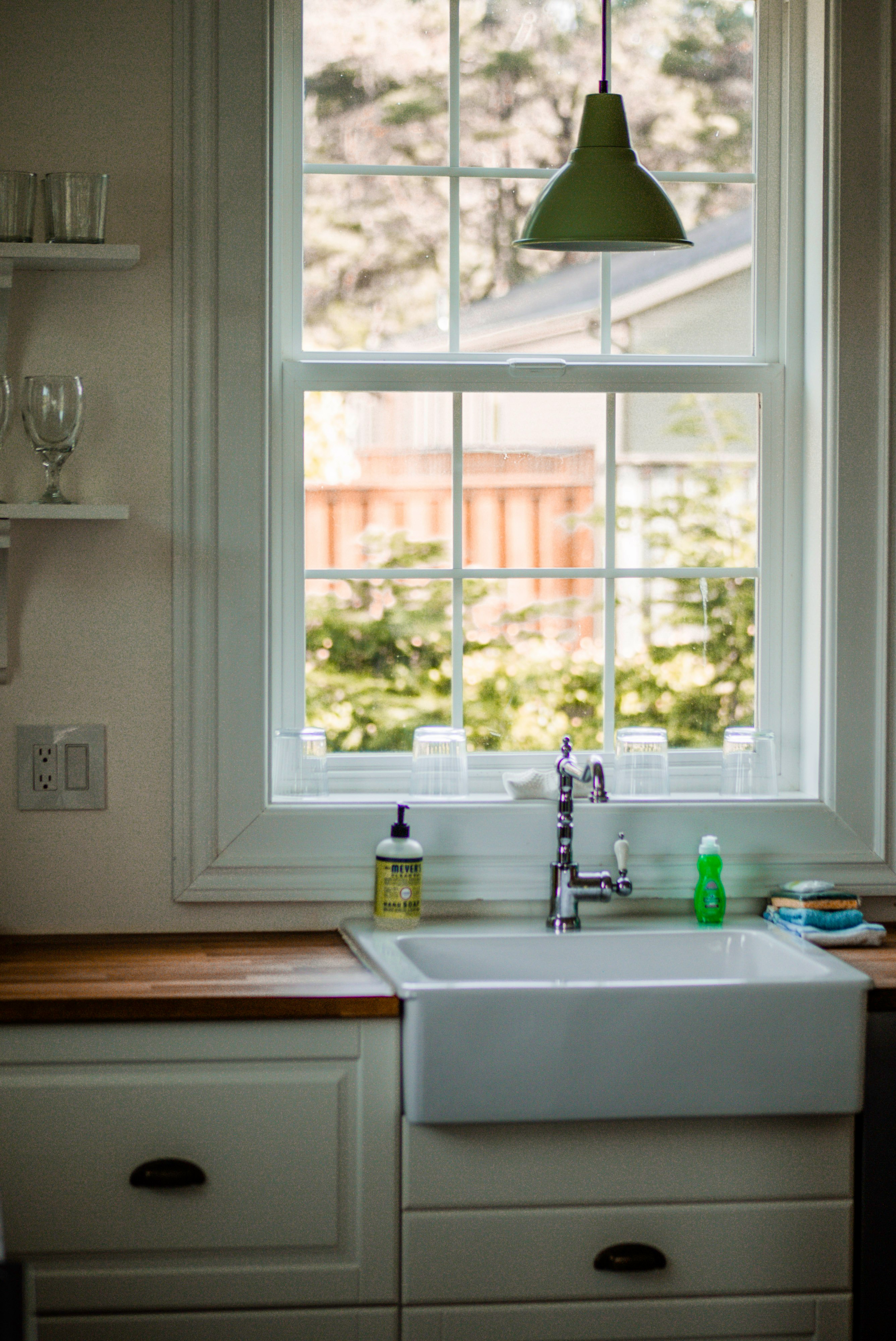 white wooden framed glass window