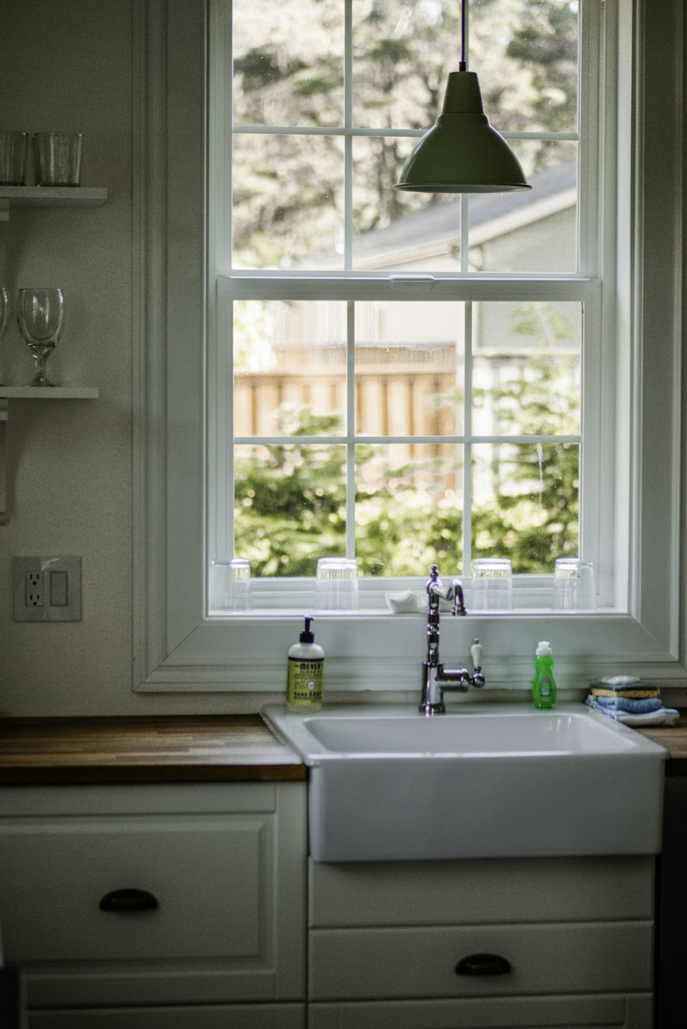 white wooden framed glass window