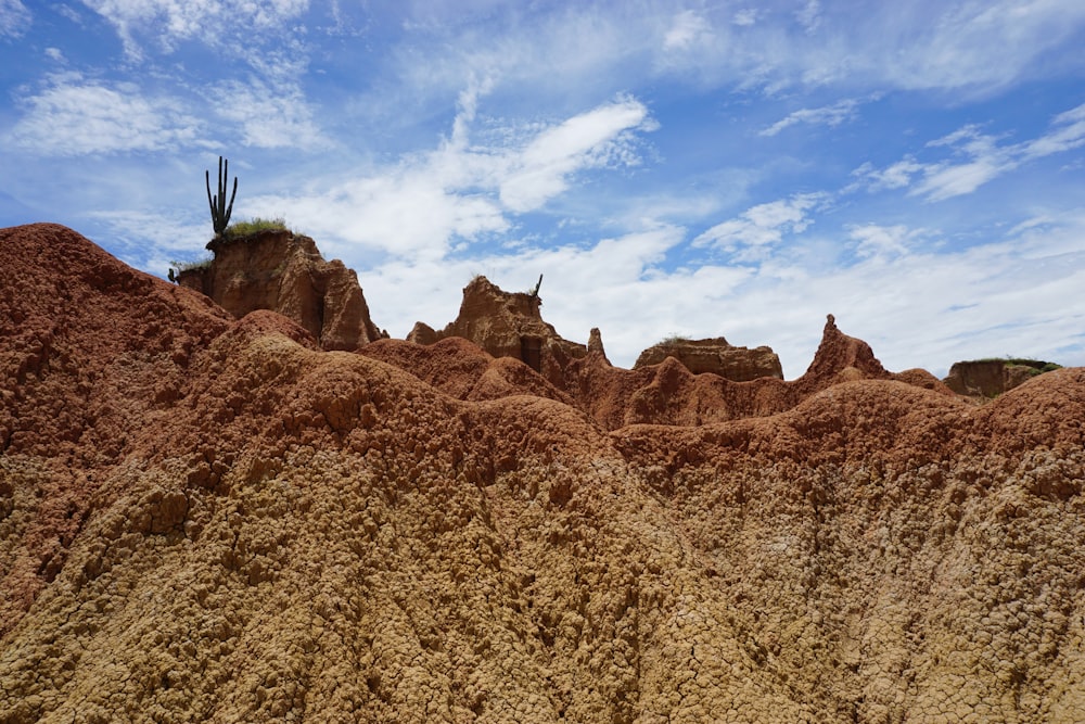 a large pile of dirt sitting on top of a hill
