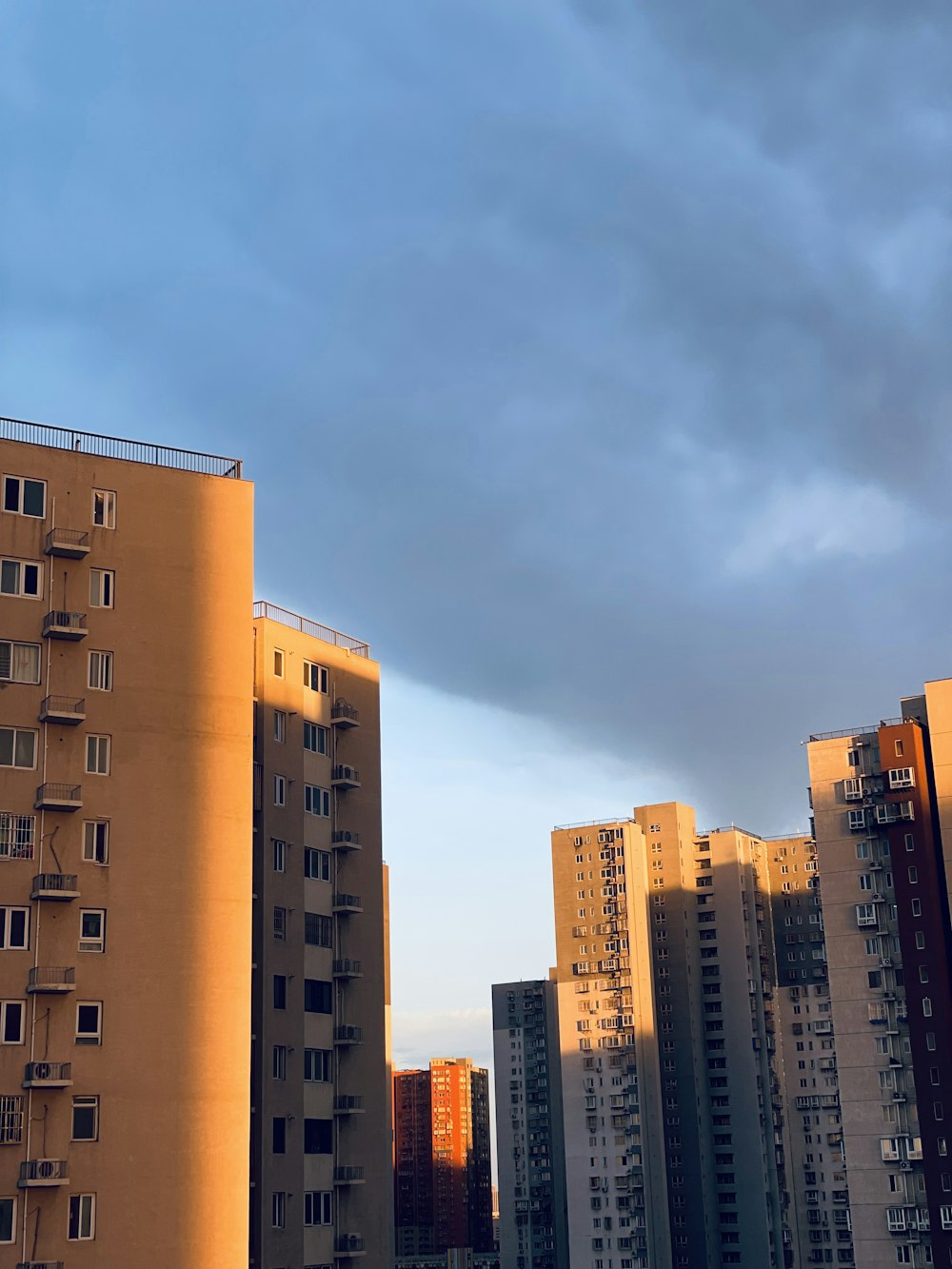 a group of tall buildings sitting next to each other