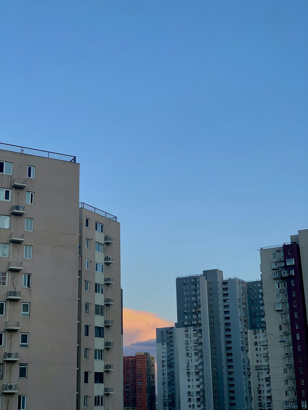 a view of a city with tall buildings