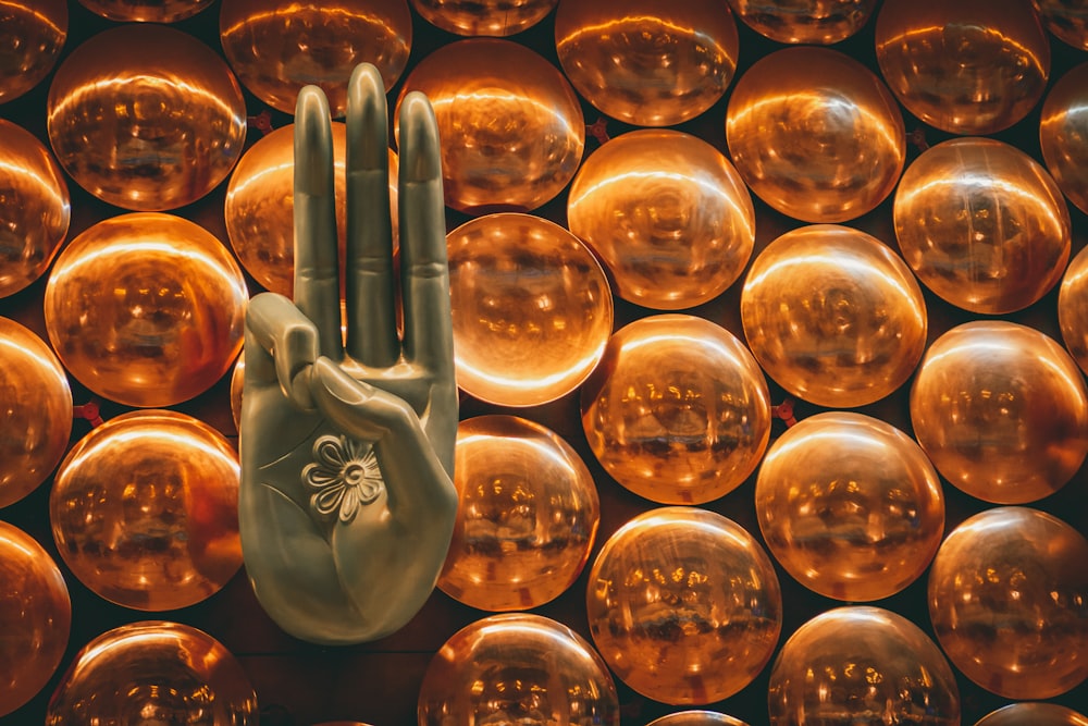 gold heart shaped ornament on brown wooden table