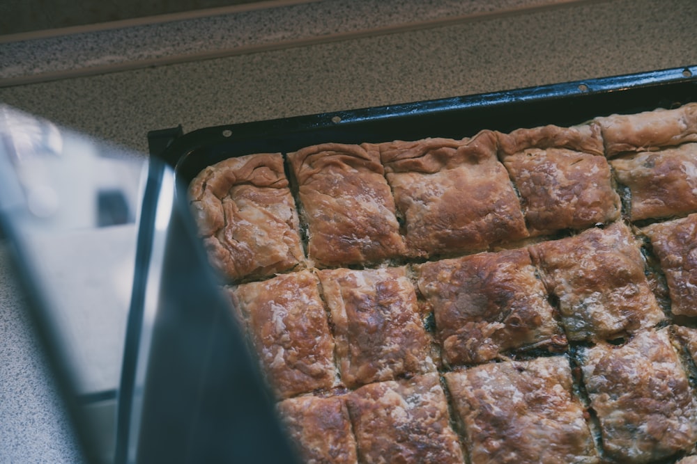 a pan of food that is sitting on a counter