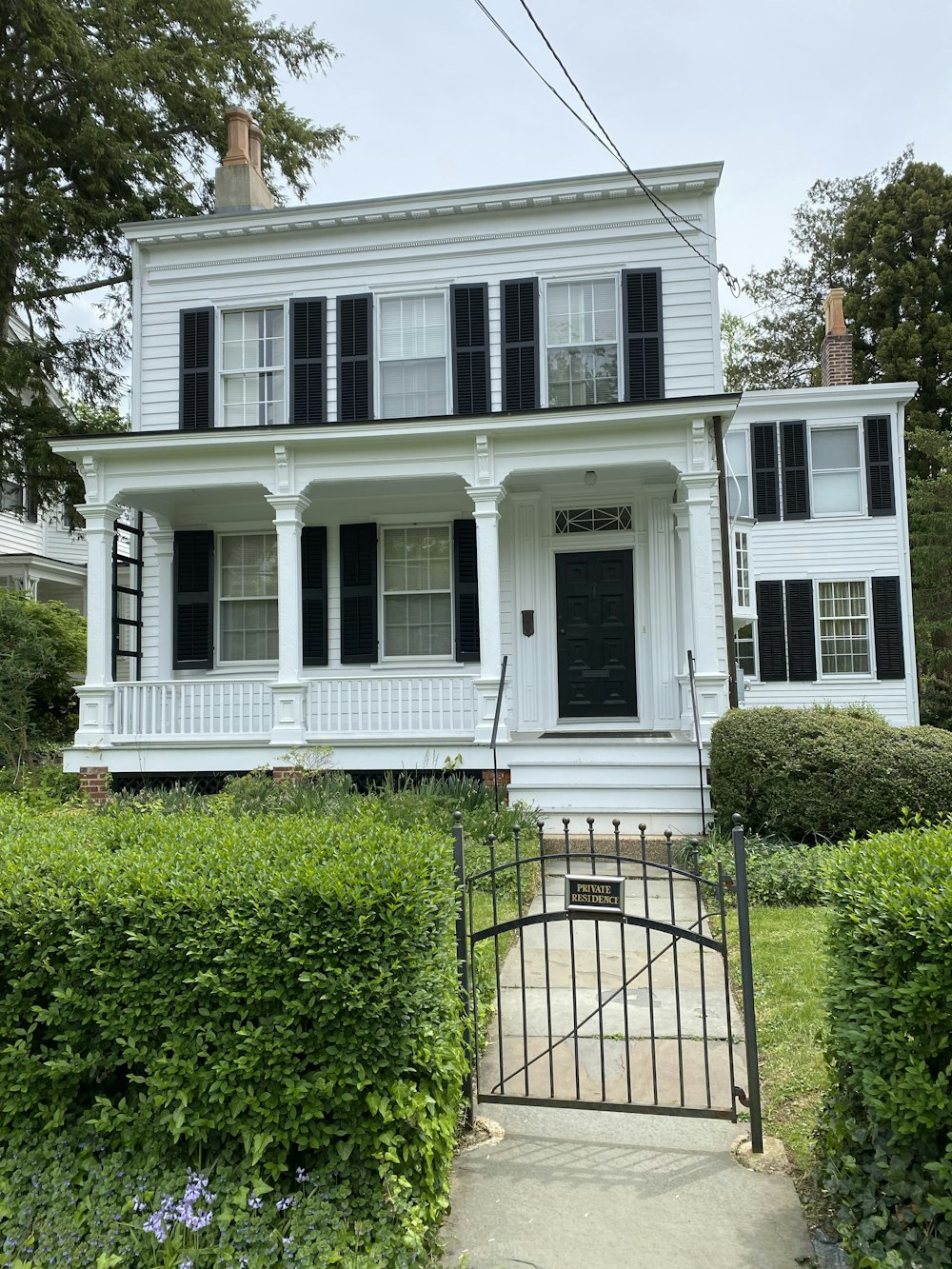 white and gray 2 storey house