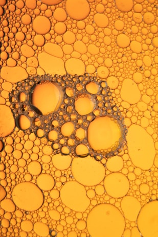 water droplets on yellow surface