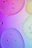 a close up of water droplets on a surface