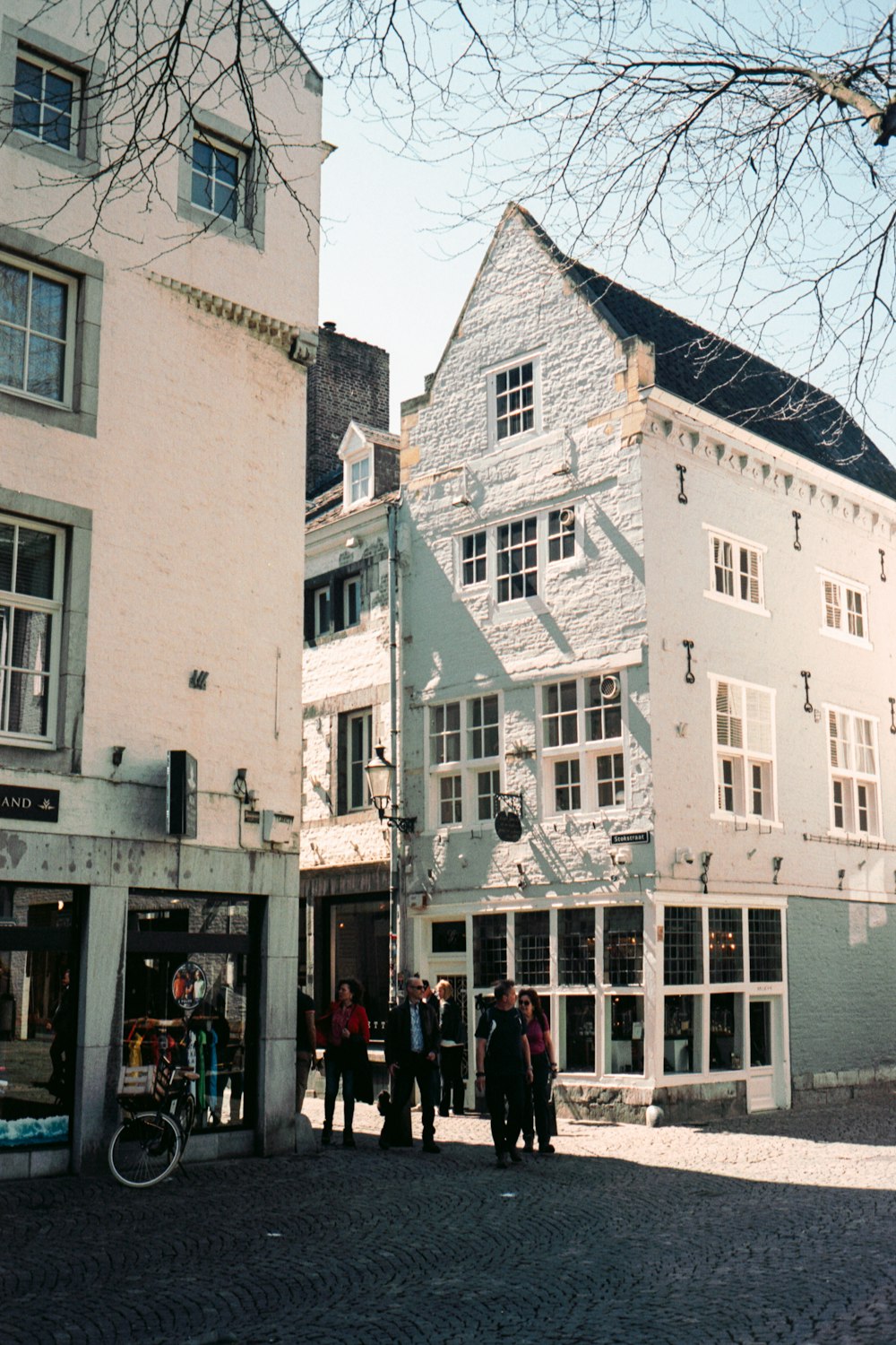 people walking on street near building during daytime