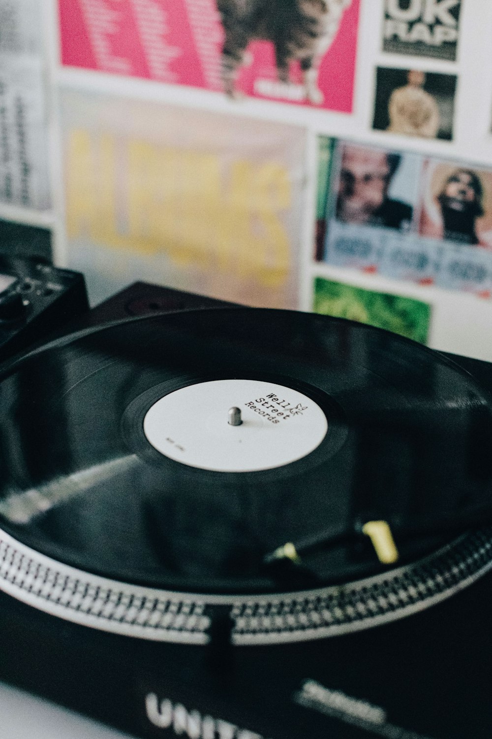 black vinyl record on black vinyl record player