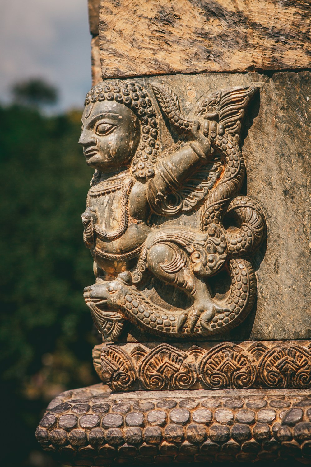 gold dragon statue during daytime