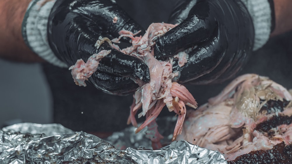 red and black shrimp on aluminum foil