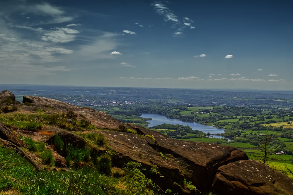 a view of a valley and a river from a hill