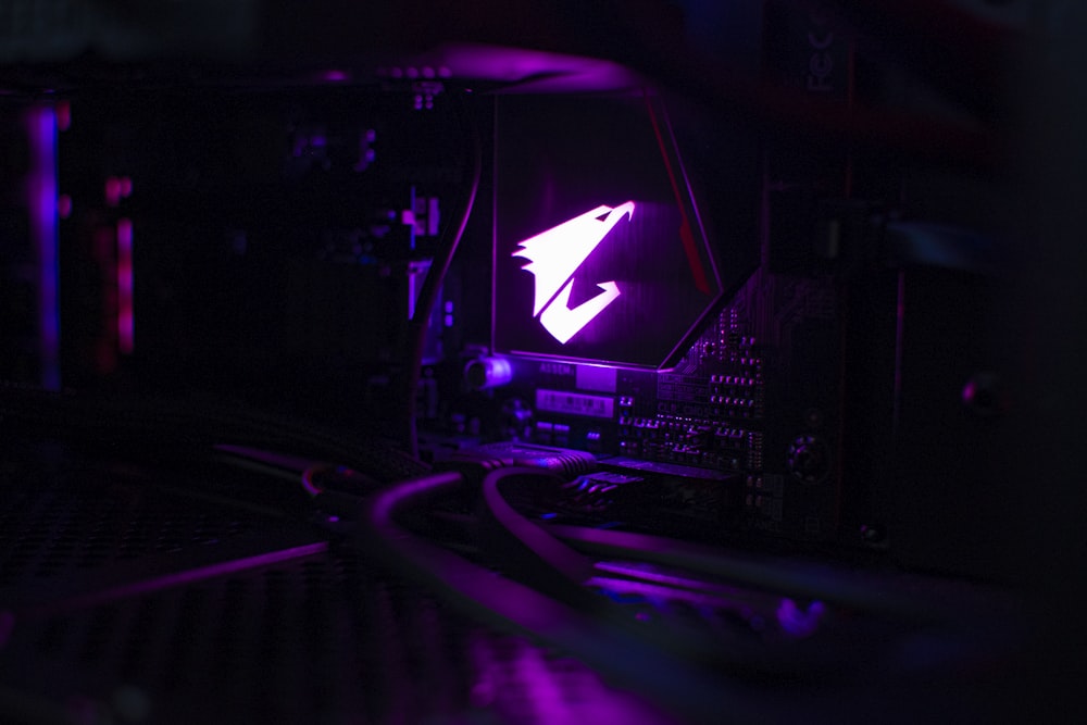 a close up of a computer in a dark room