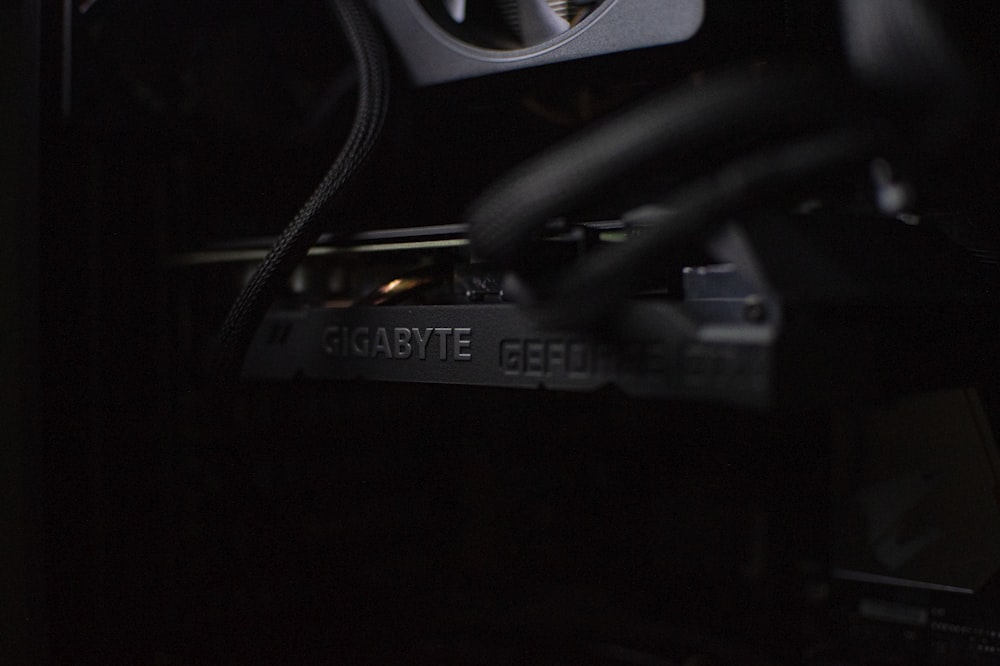 a close up of a black computer case in the dark