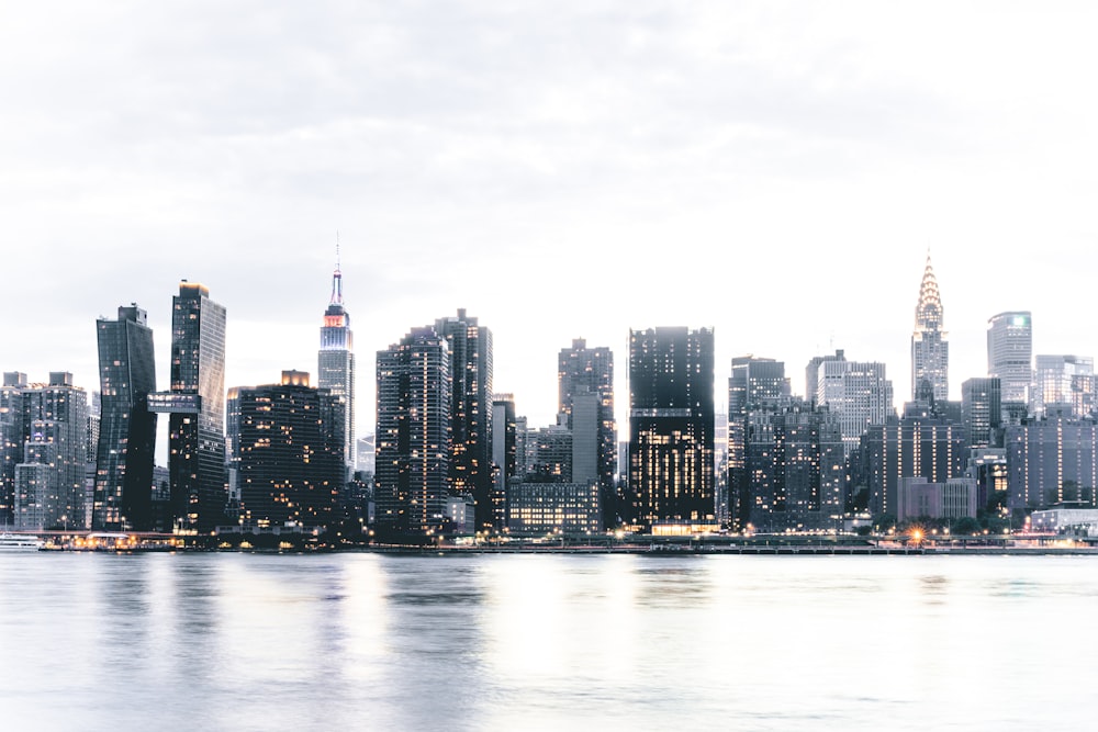 city skyline under white sky during daytime