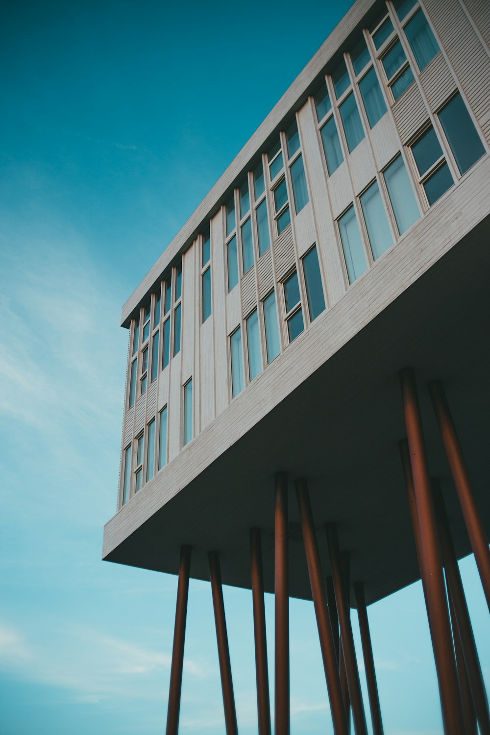 white concrete building under blue sky during daytime