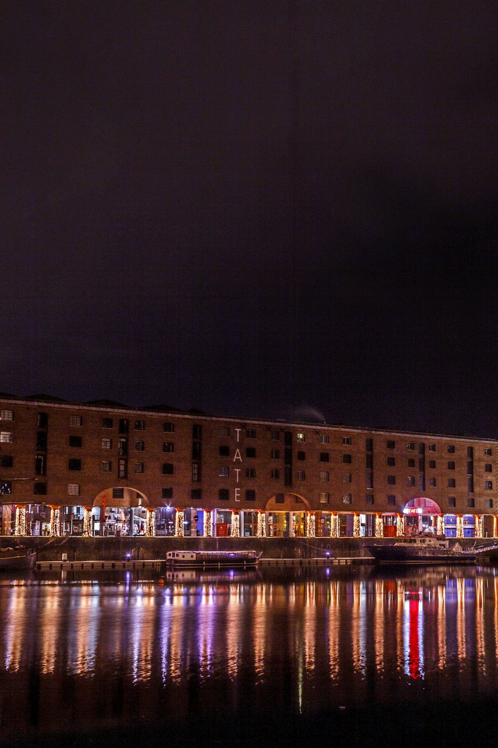 a large building is lit up at night