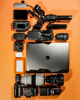 a laptop computer sitting on top of a table