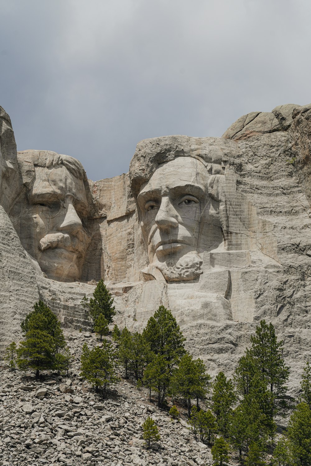 a group of presidents carved into the side of a mountain