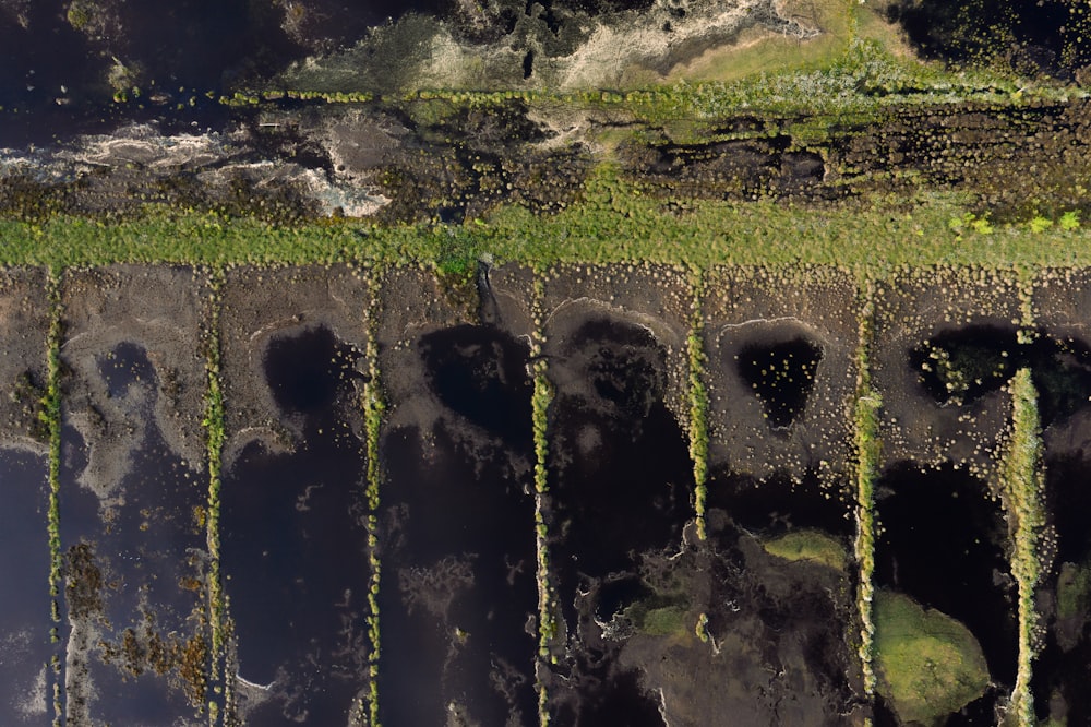 an aerial view of the water and land