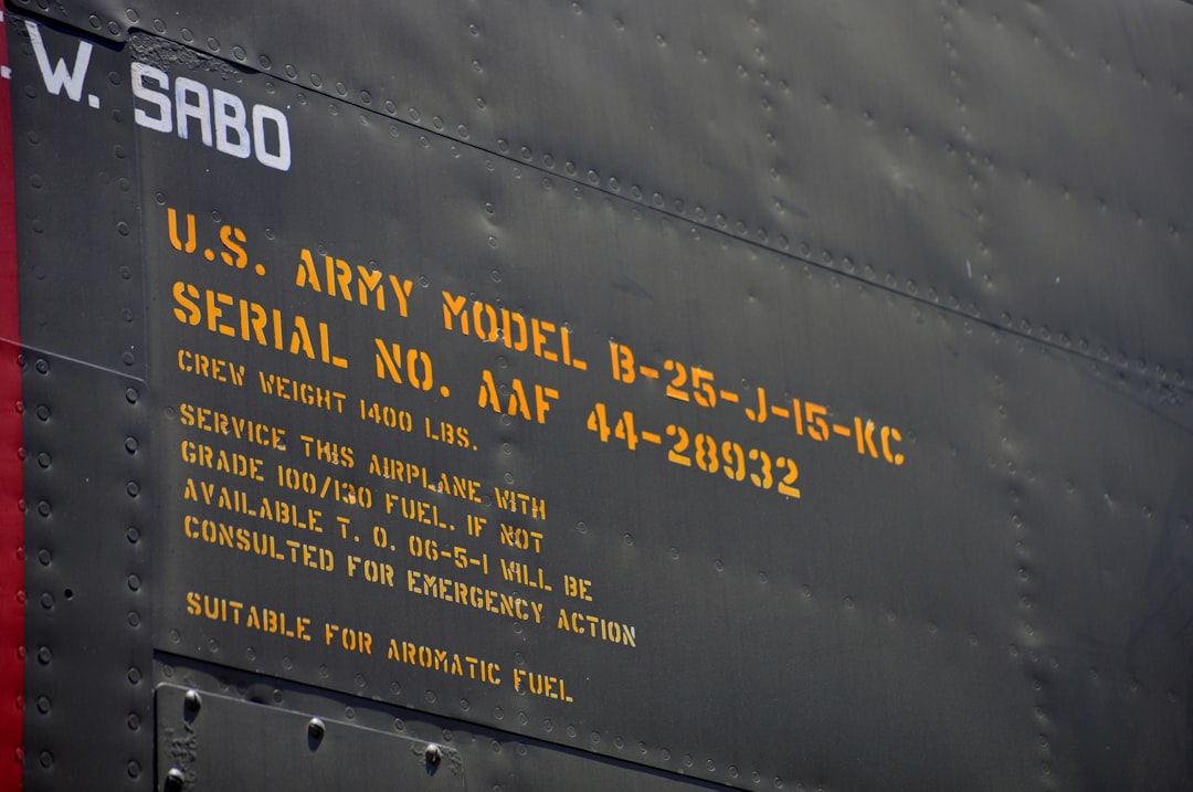 a close up of the side of a military aircraft, SPECIFICATIONS (B-25J)<p></figure>Crew: 6 (Pilot, Co-Pilot, Bombardier/Navigator, Flight Engineer, Radio Operator and Tail Gunner)</p><p>Wingspan: 68 feet</p><p>Length: 53 feet</p><p>Maximum Speed: 272 miles per hour</p><p>Cruising Speed: 230 miles per hour</p><p>Maximum Range: 1,350 miles</p><p>Engines: Two Wright R-2600-92s (1,700 hp each)</p><p>Maximum Bomb Load: 3,200 pounds</p><p>Armament: Twelve to eighteen .50 caliber machine guns