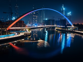 a bridge over a body of water at night