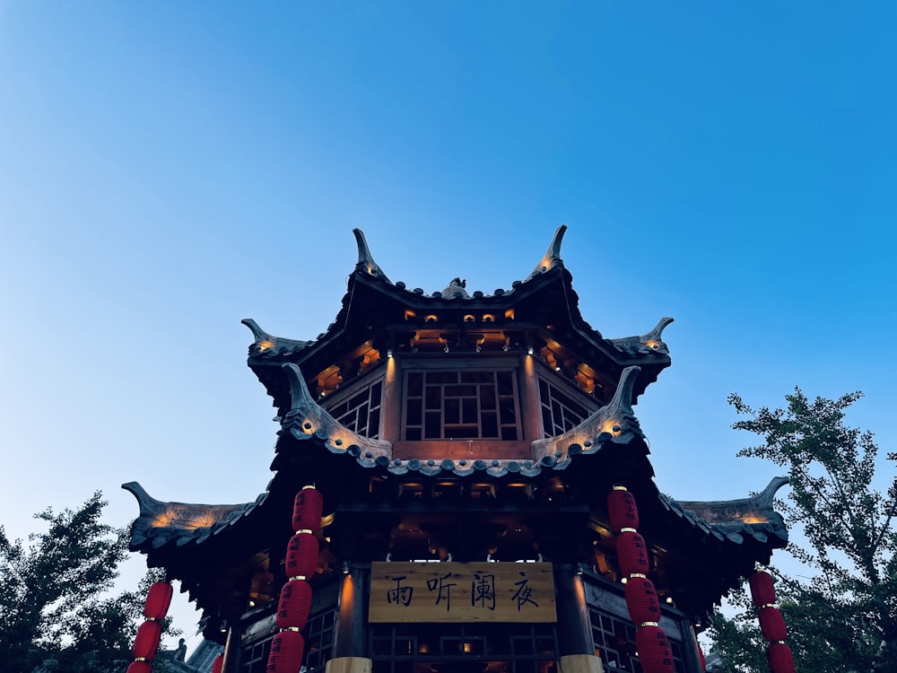 a tall building with a sky in the background