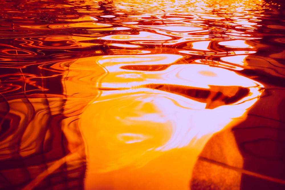 the reflection of a boat in the water