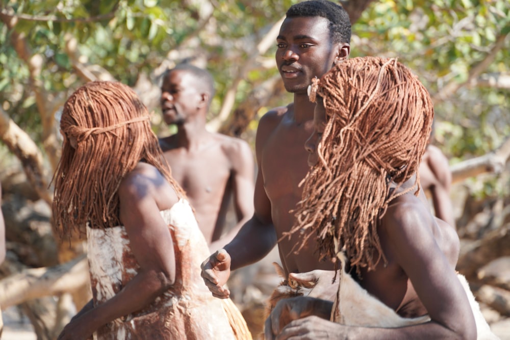 a group of men standing next to each other