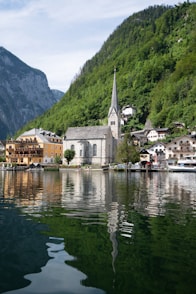 a lake with a church in the middle of it