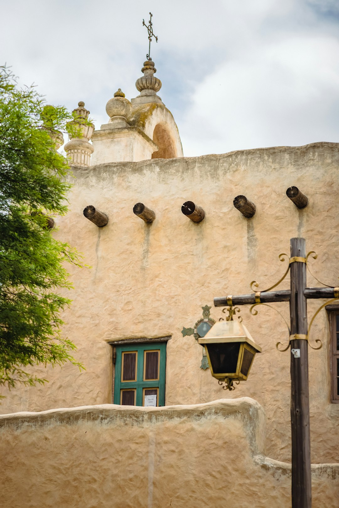 brown concrete building with black sconce