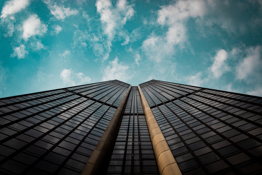 a tall building with a sky background