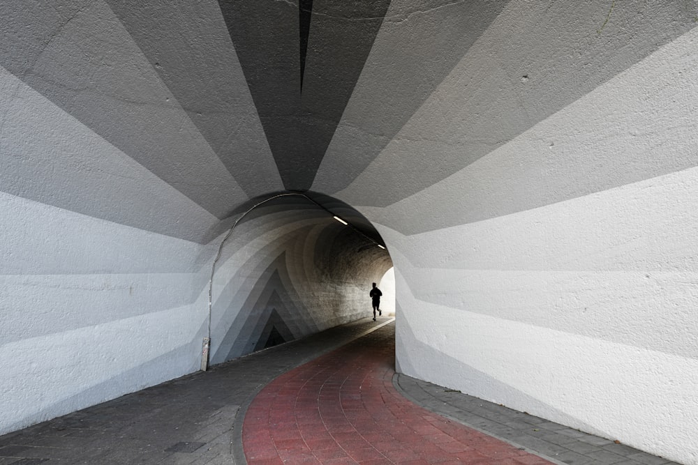 white and red concrete hallway