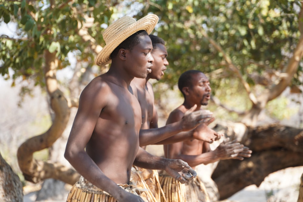 a group of men standing next to each other