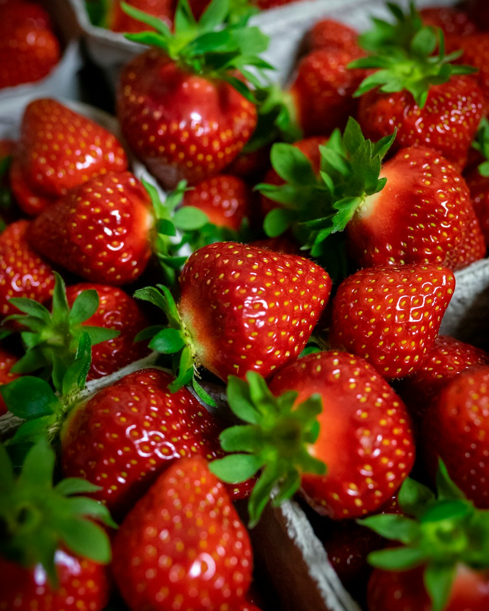 a close up of a bunch of strawberries