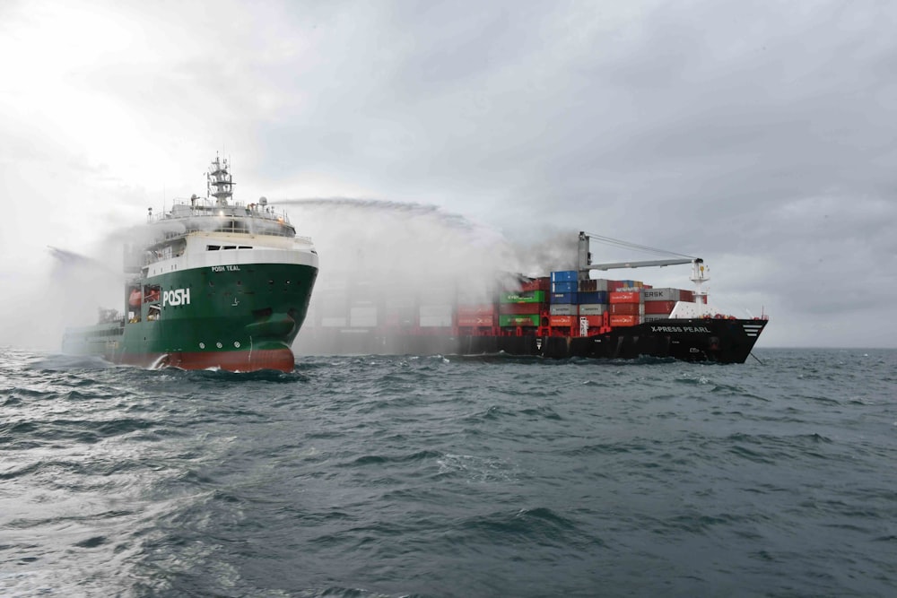 a large boat in the water near a large ship