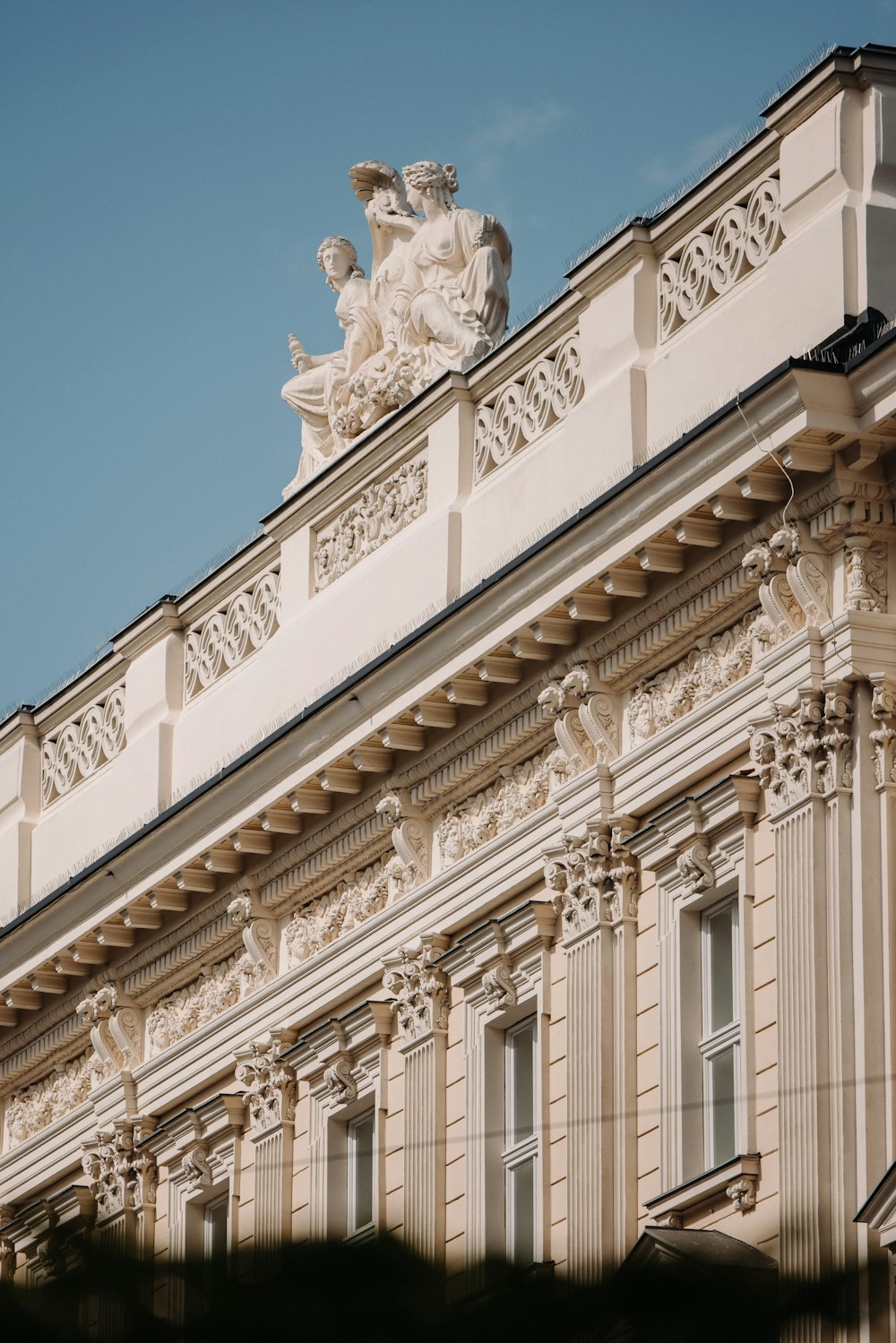 a building with a statue on top of it