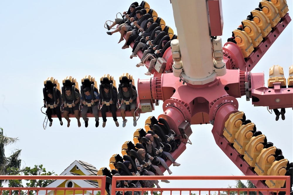 a roller coaster with a bunch of people on it