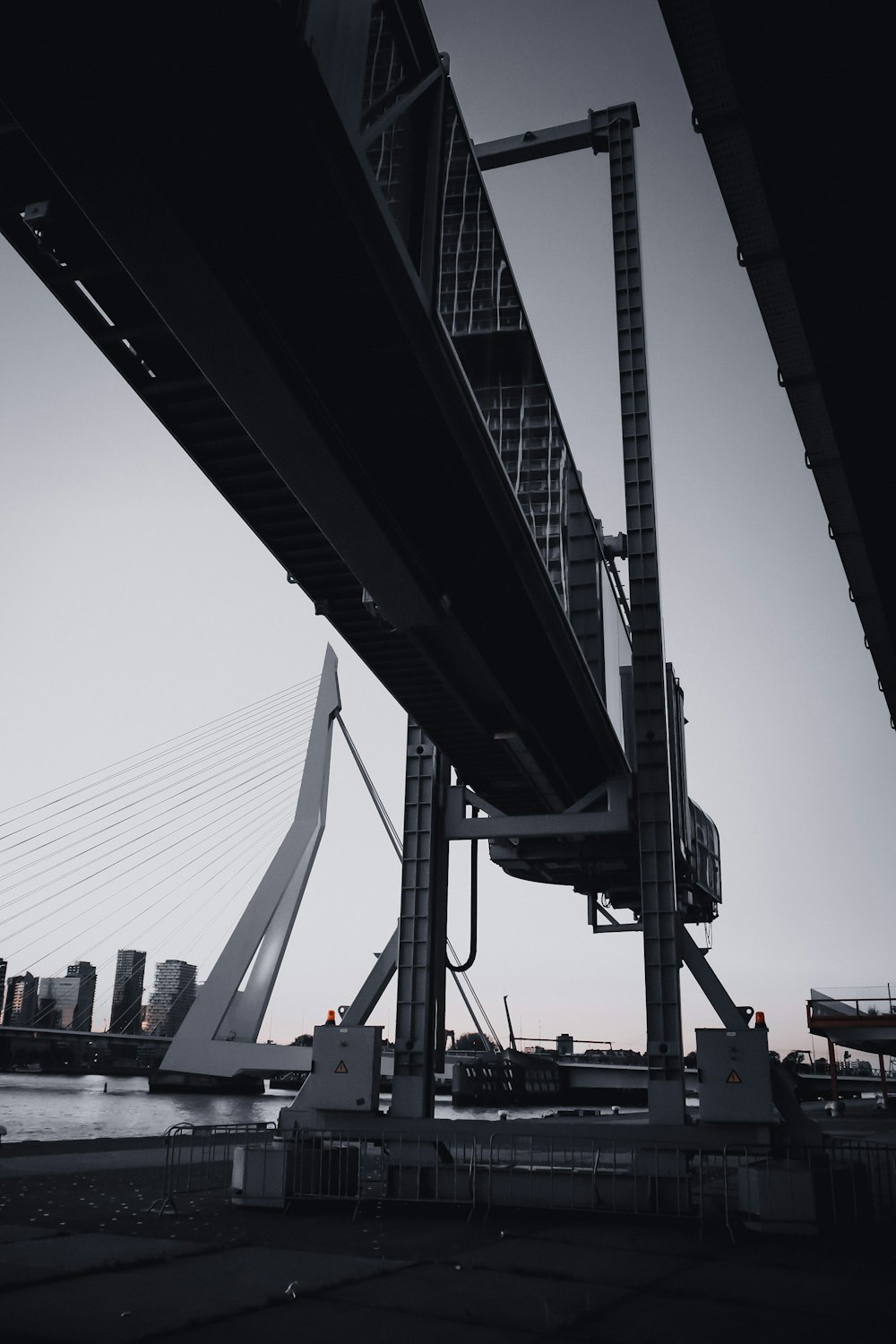 a tall bridge spanning over a body of water