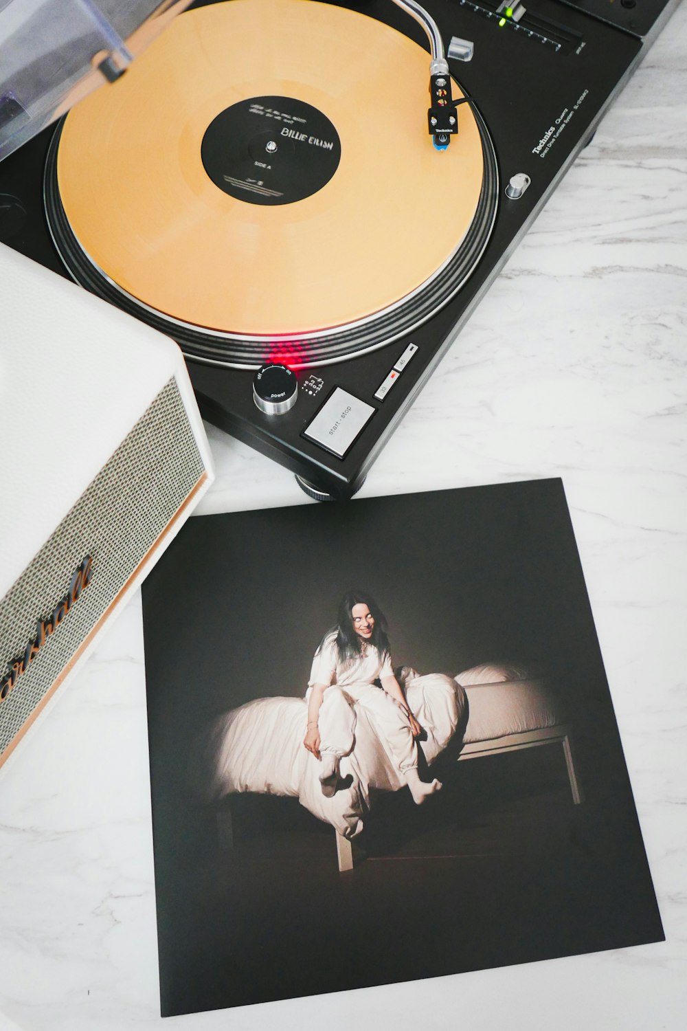 a record player sitting on top of a table