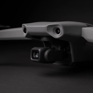 a close up of a camera attached to a skateboard