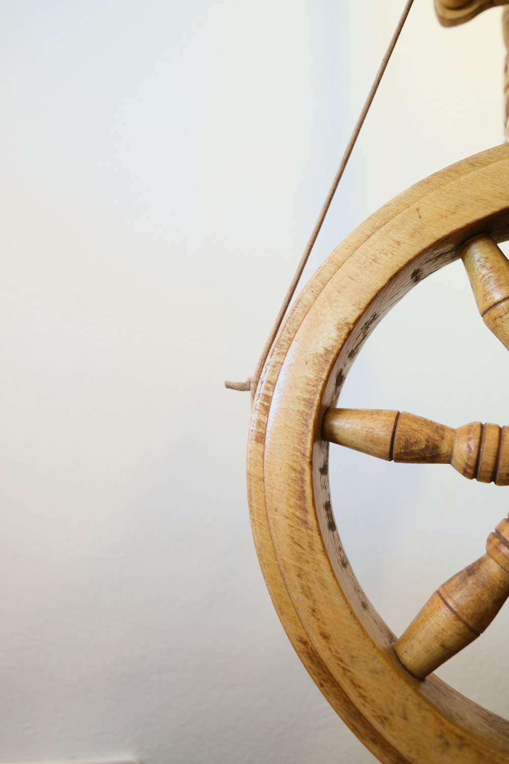 a close up of a spinning wheel on a wall
