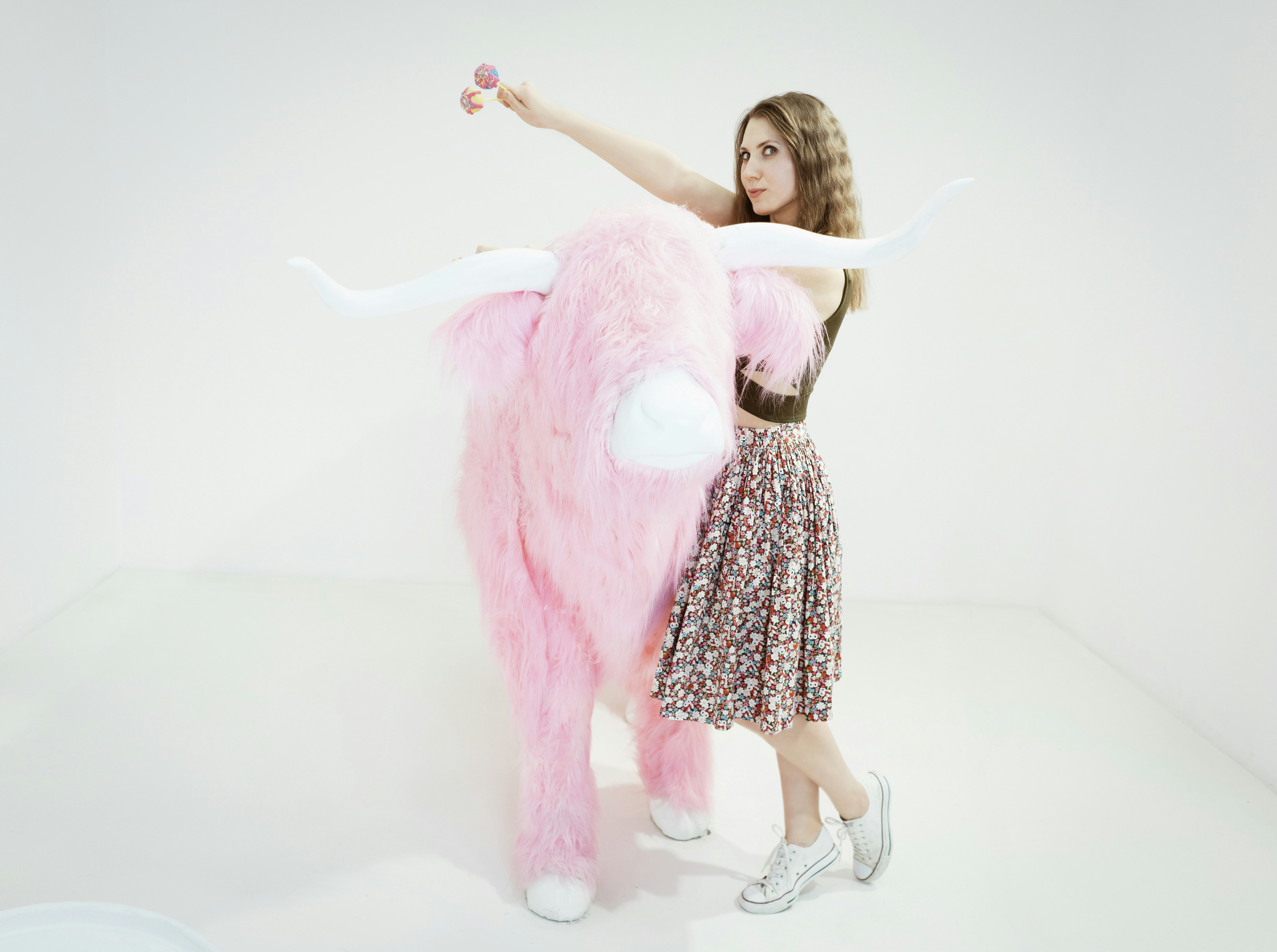 Girl holding cake pops