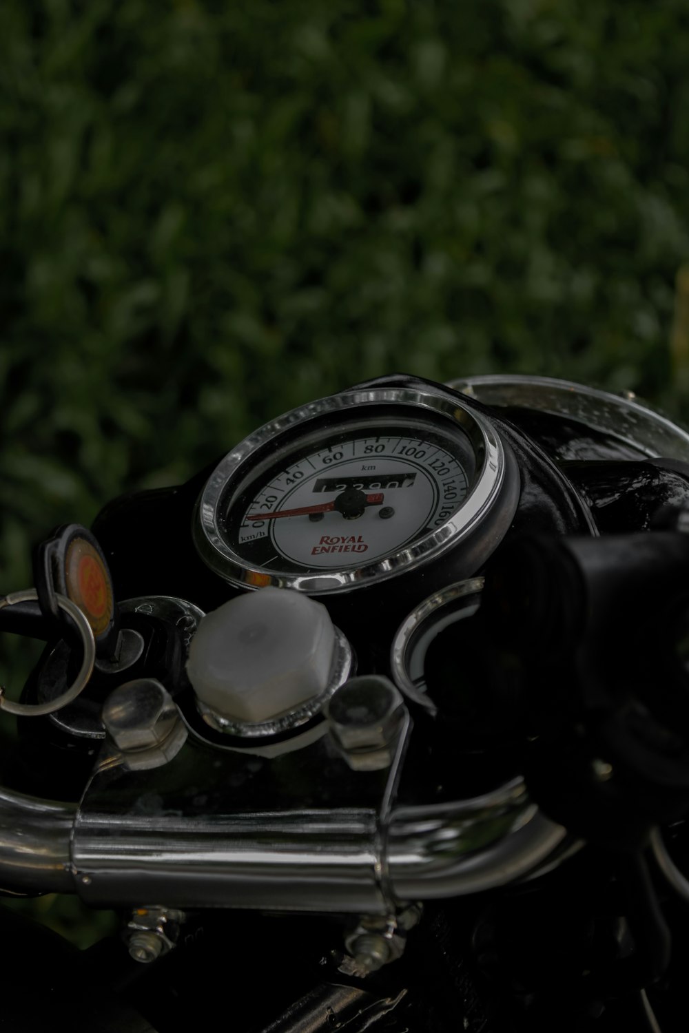 a close up of a motorcycle with a speedometer