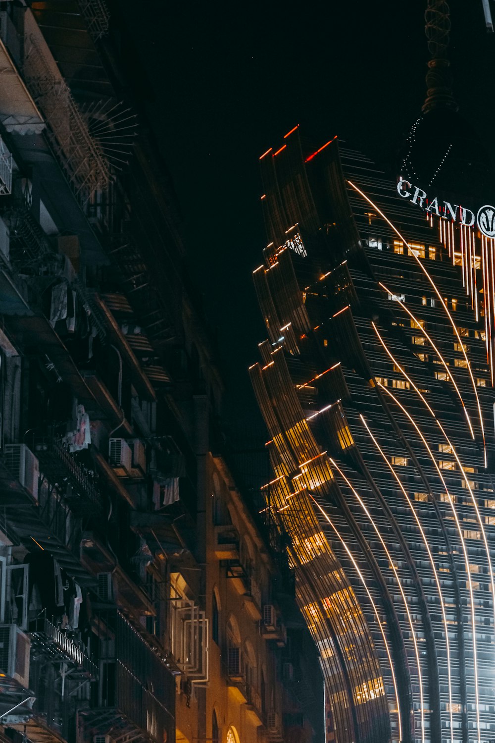 a very tall building lit up at night