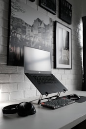 black laptop computer on table