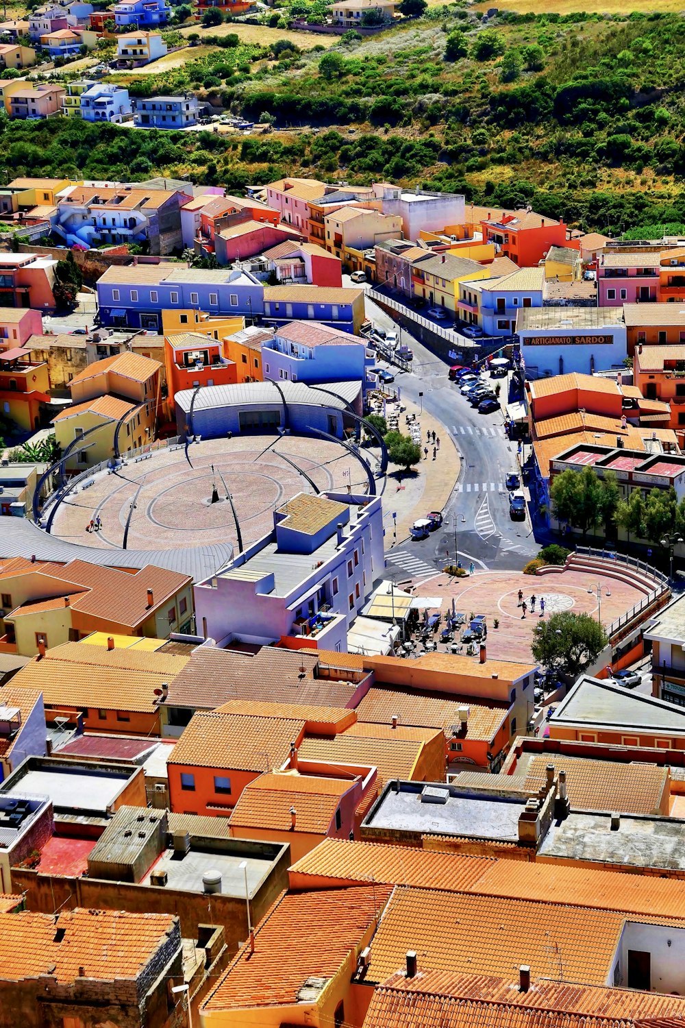 an aerial view of a city with lots of buildings