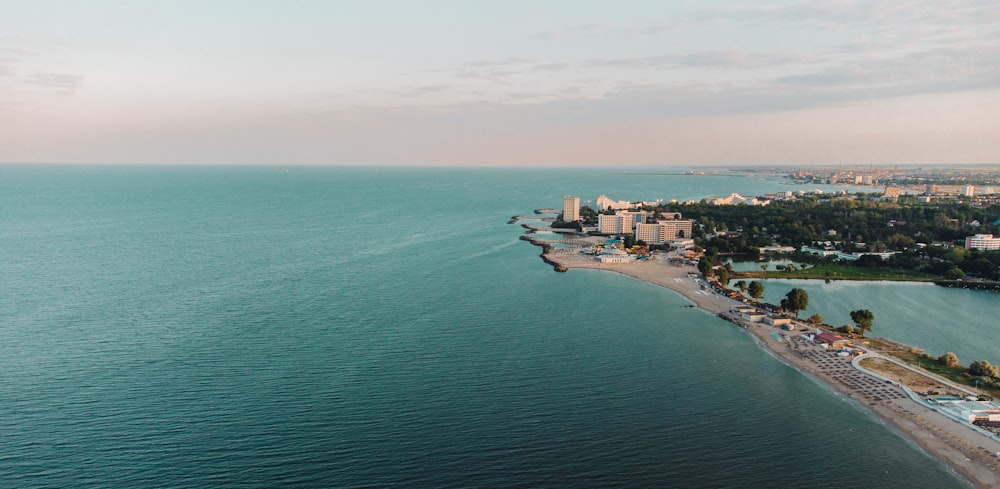 an aerial view of a beach and a city