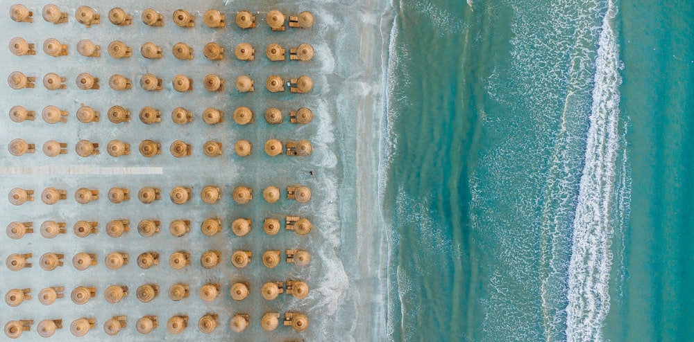 an aerial view of a sandy beach and ocean